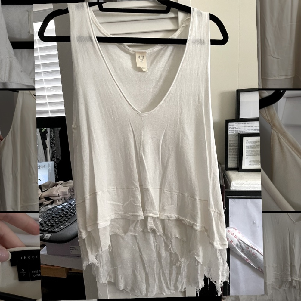 Long sleeveless top. Tattered edge flowy bottom.